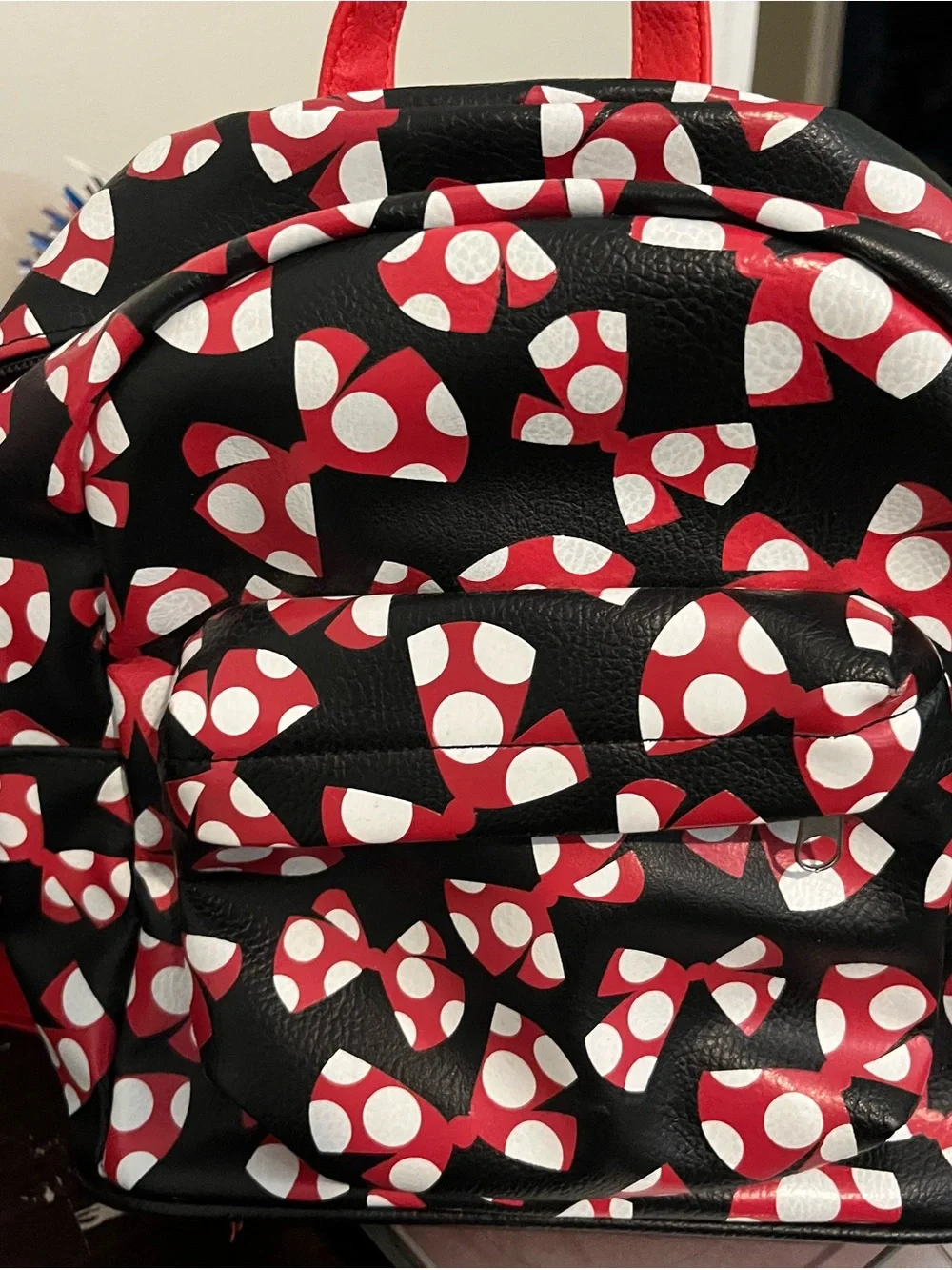 Disney Black Backpack with Red and White Bow Print